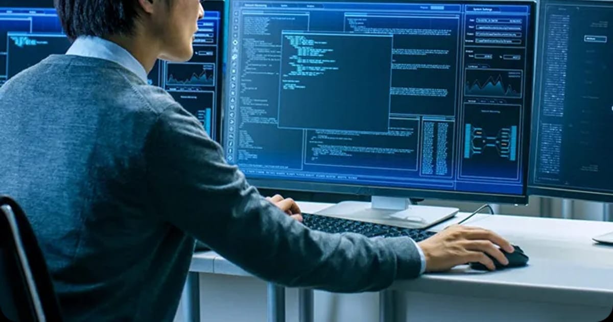 Developer building a SaaS application across multiple screens